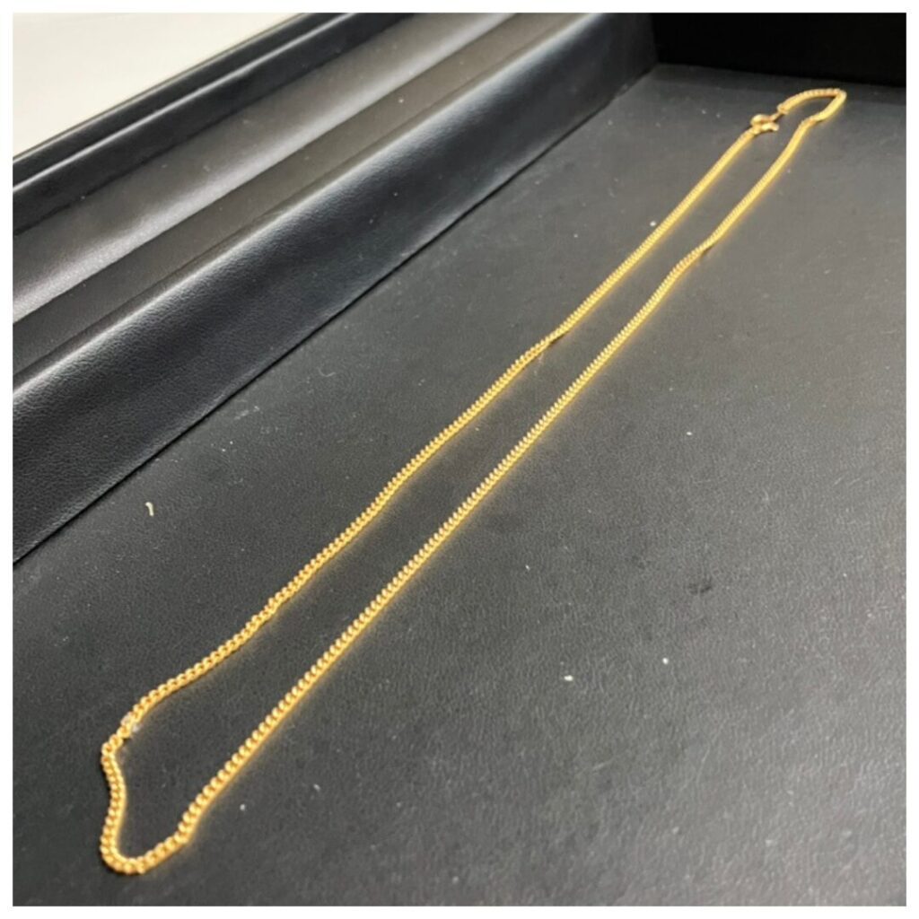 金のネックレスの画像